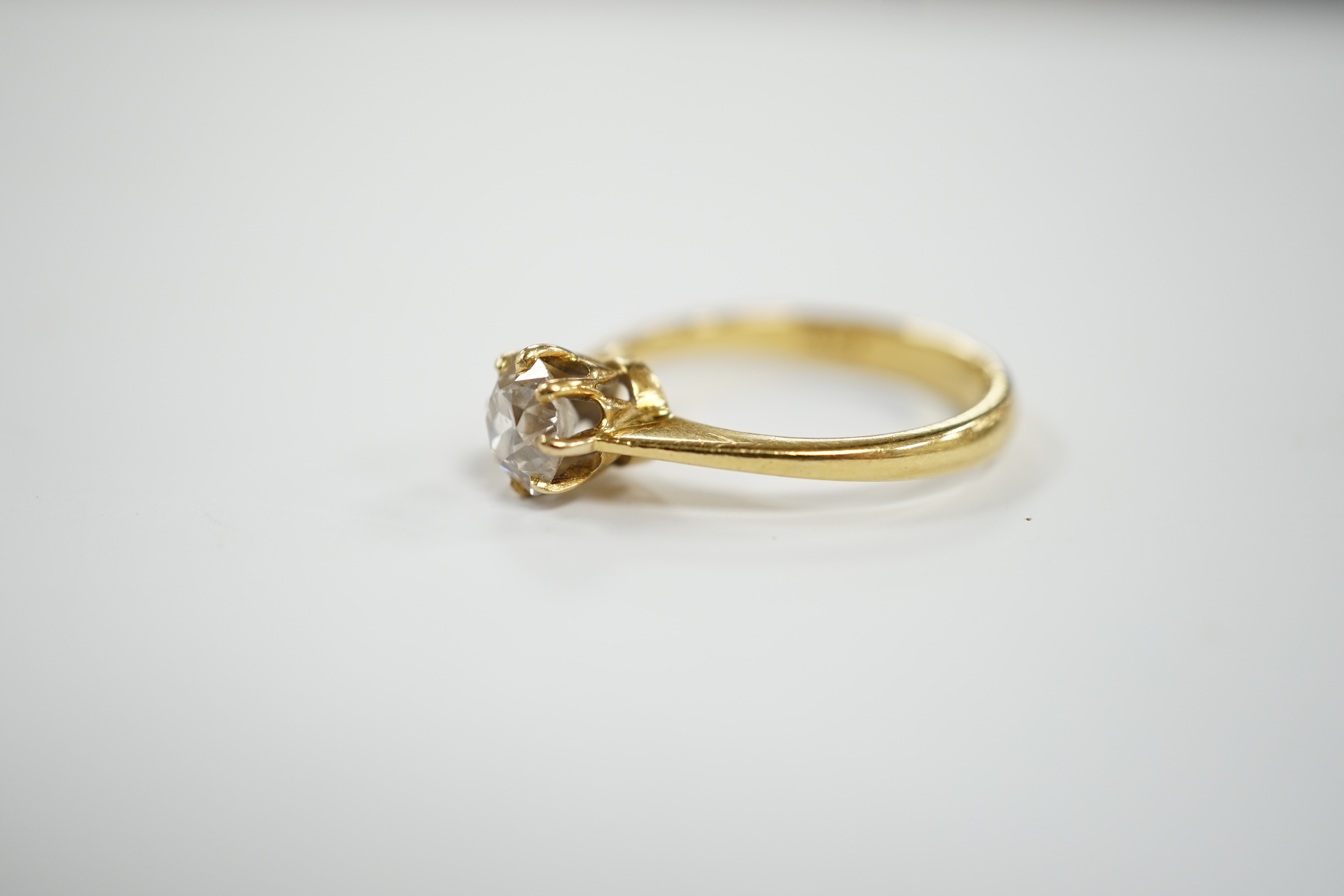 An 18ct gold and solitaire diamond set ring, size O, gross weight 3.5 grams, stone diameter approx. 6.2mm.